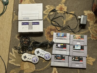 Super Nintendo Entertainment System with 6 games & 2 controllers