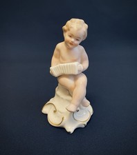 Putto con fisarmonica Capodimonte 