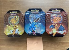 POKEMON HIDDEN FATES TIN ARTSET : Charizard Raichu Gyarados