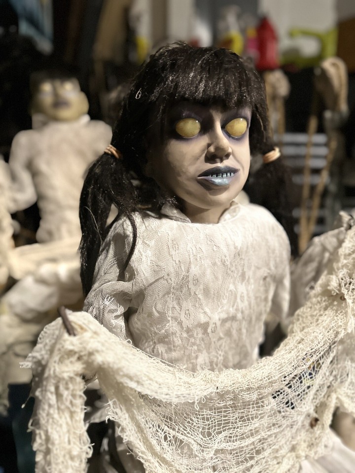 Spirit Halloween Animated Animatronic Life Size Prop Zombie Swing Girl