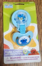 Sesame Street Beginnings Cookie Monster Pacifier & Holder with Silicone ring