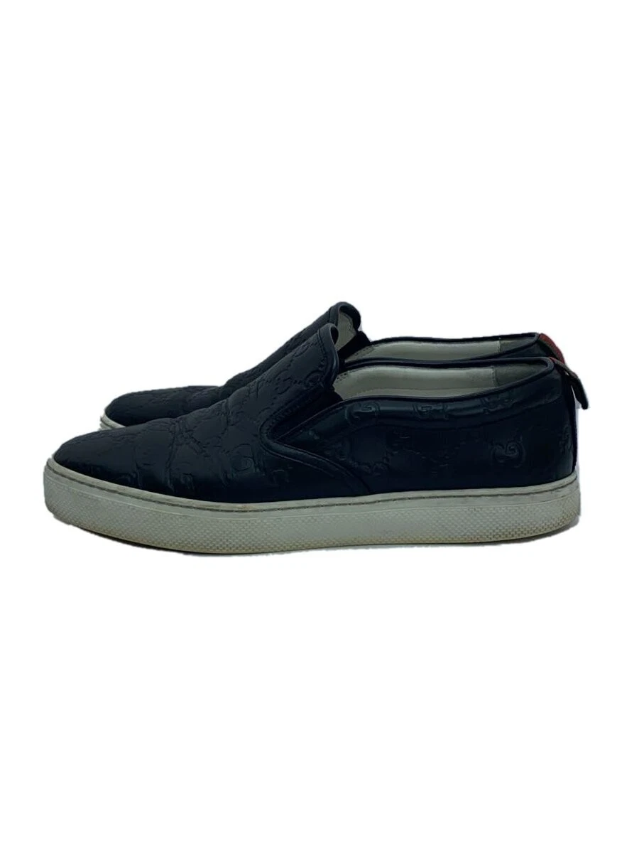 Baskets basses Gucci cuir noir UK7,5 occasion, semelles portées