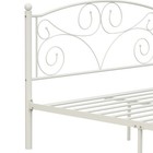 White metal bed frame with scalloped unique flower headboard and footboard, featuring curved steel rods and decorative scroll patterns.
