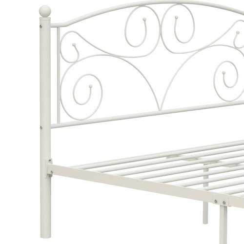 White metal bed frame with scalloped unique flower headboard and footboard, featuring curved steel rods and decorative scroll patterns.