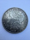 1887 Morgan Dollar GEM BU/UNC. Rainbow Toning 90% Silver $1 Silver Coin