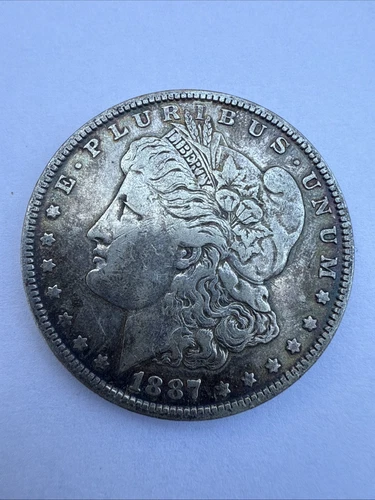 1887 Morgan Dollar GEM BU/UNC. Rainbow Toning 90% Silver $1 Silver Coin