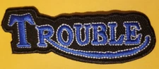 TROUBLE Embroidered Patch approx 1.25x3.75" blue