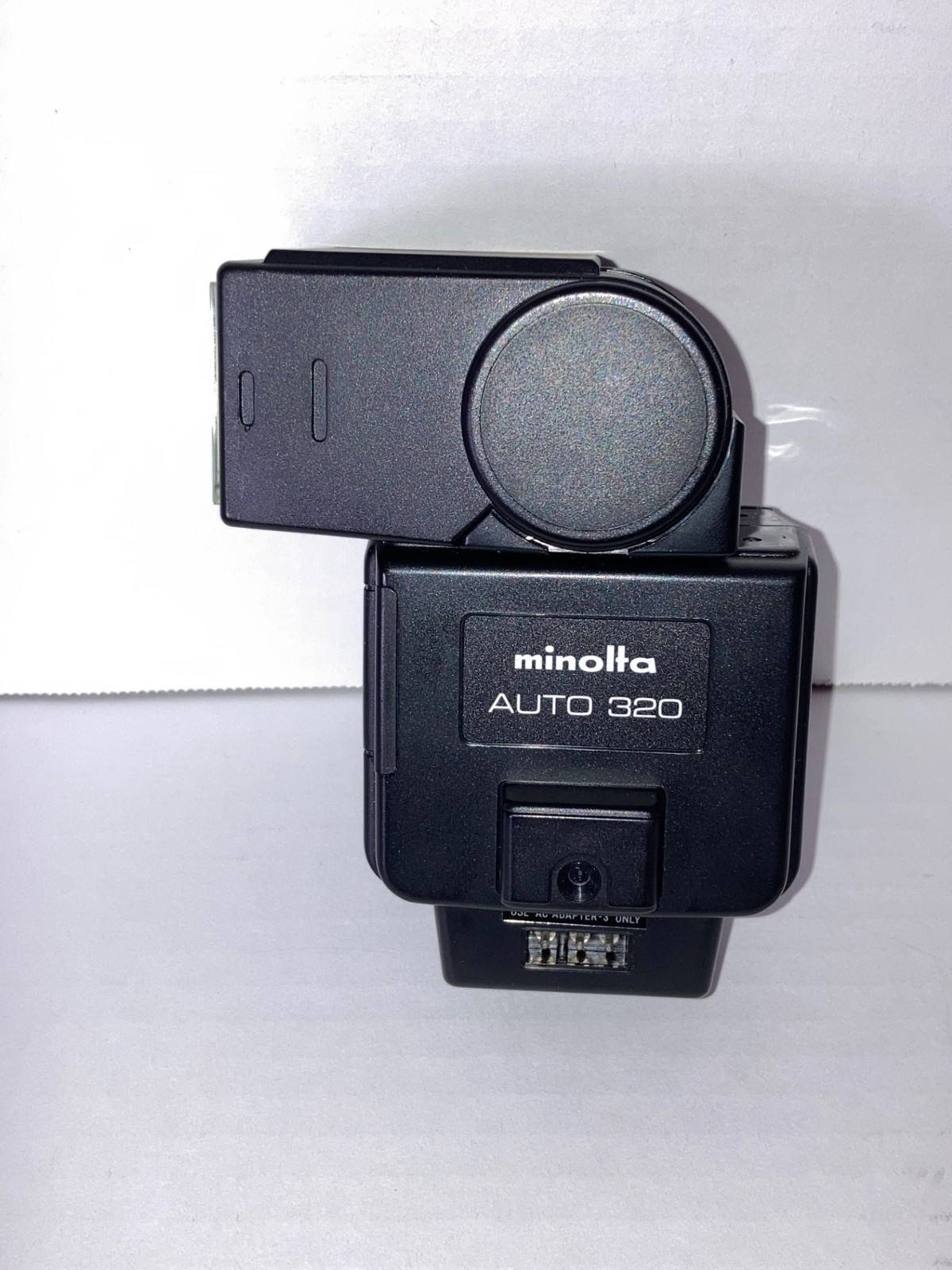 Minolta Auto 320 flash unit with original case - tested and working
