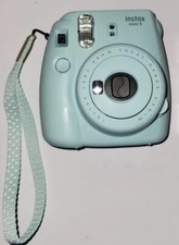 Fujifilm Instax Mini 9 Ice Blue Instant Film Camera With Batteries and used Film