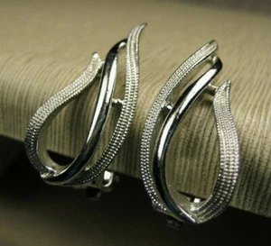 Vintage Signed Sarah Coventry Textured Silver Tone Fire Flame Clip On  Earrings
