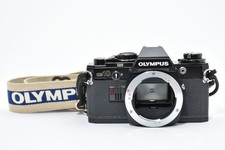Near Mint- Olympus OM10 35mm SLR Film Camera Black Body Only 28133