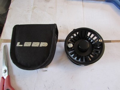 stunning used once loop multi power matrix 6/9 salmon fly fishing reel 4'' pouch