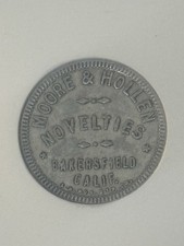c. 1920 Good For 25 Cents Token Moore & Hollen Novelties Bakersfield CA NGC AU58