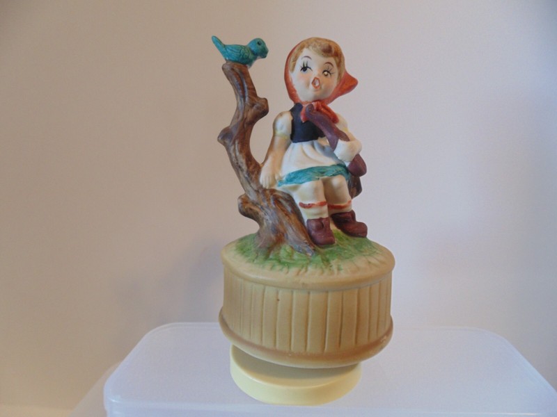 Vintage Taiwan Girl Sitting On Log Figurine Rotating Music Box
