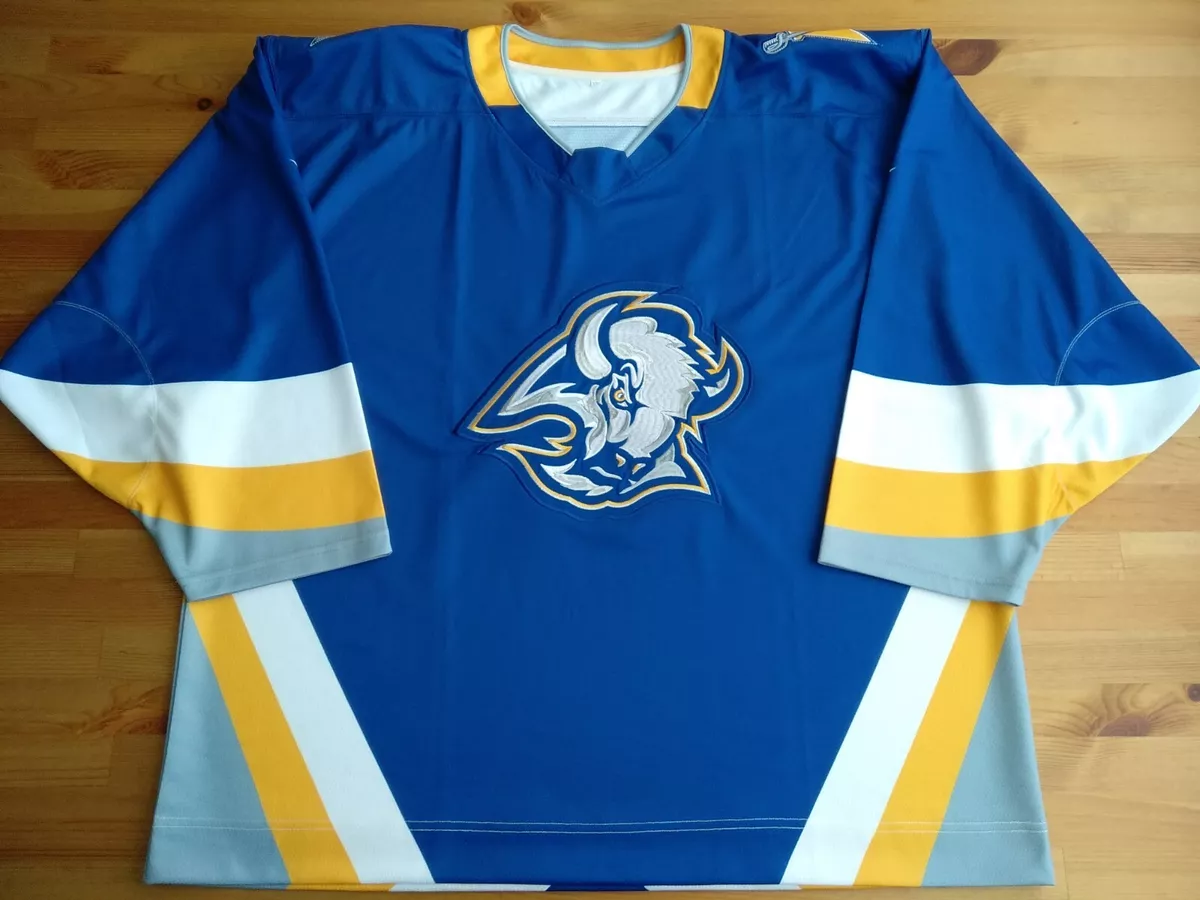 Sabres reveal blue and gold “goathead” Reverse Retro jersey