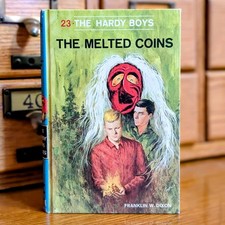 23 The Melted Coins (1970-Red Number):  Hardy Boys Book Blue-Back