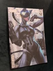 ABSOLUTE BATMAN #13 ARTGERM CATWOMAN VARIANT 1