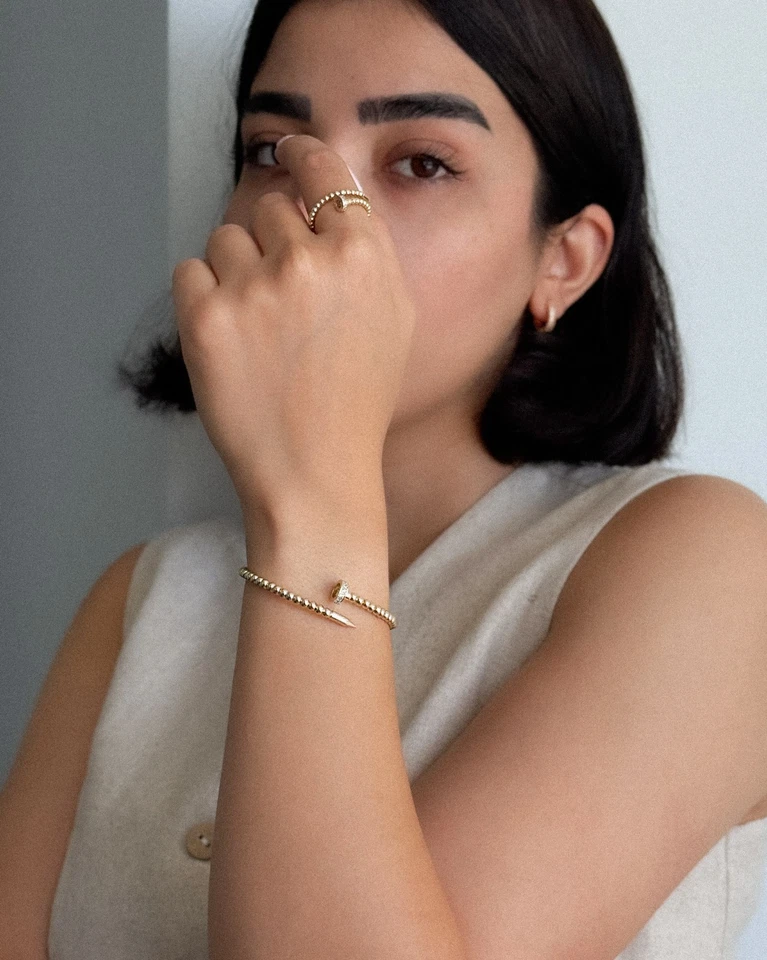 Juego de pulsera y anillo de uñas chapadas en oro: Joyería de circonita cúbica ajustable Foto 3 de 4