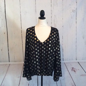 black and gold polka dot shirt