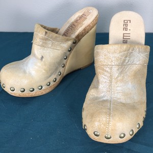metallic silver clogs