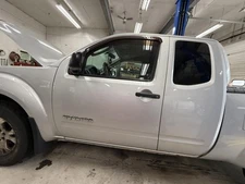 Used Front Left Door Assembly Front fits: 2011 Suzuki Equator w/o body side moul