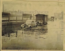 1936 Press Photo Cars & trucks driving along flooded Quay St. in Albany, NY