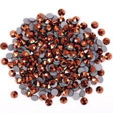 2088 XIRIU Rose Gold Flat Backs Hotfix glued onto surface and tex Rhineston