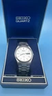 watch Seiko SQ Quartz 5Y23-8A11 Silver 33mm Date Date+ new battery+ box
