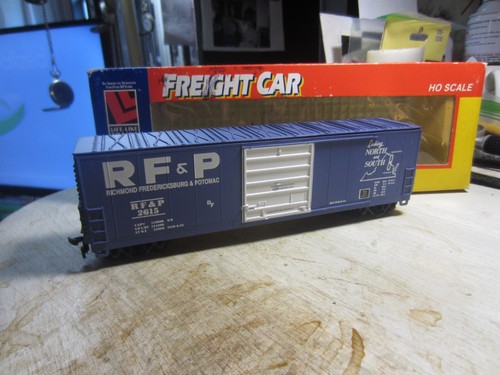 HO trains; Mint in box LIFE LIKE RF&P 50 foot track ready box car