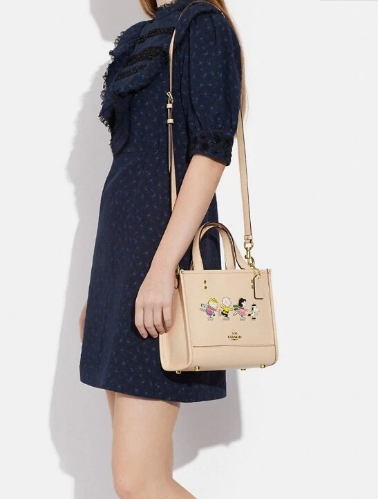 Borsa Coach Limited Ed X Peanuts Dempsey 22 con motivo Snoopy and Friends Nuova con etichette