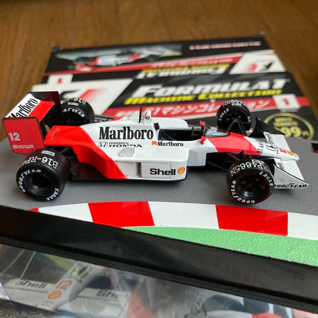 ミニカー Marlboro McLaren MP4/11 1/64 s-l1200.jpg