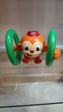 Bright Starts Roll Glow Monkey Crawling Baby Toy with Lights Sounds