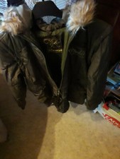 Doudoune Blouson Rivaldi Neuf T M Manche et capuche amovible 