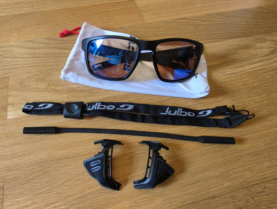 Julbo Renegade Radbrille schwarz, photochromatische braune Gläser, Beutel