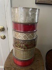 6 Rolls Of Red and gold ribbon the larger ones are wired 50 and 55 yards each