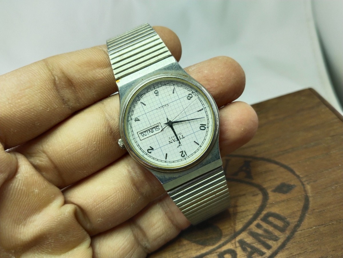 titan watch with date and day