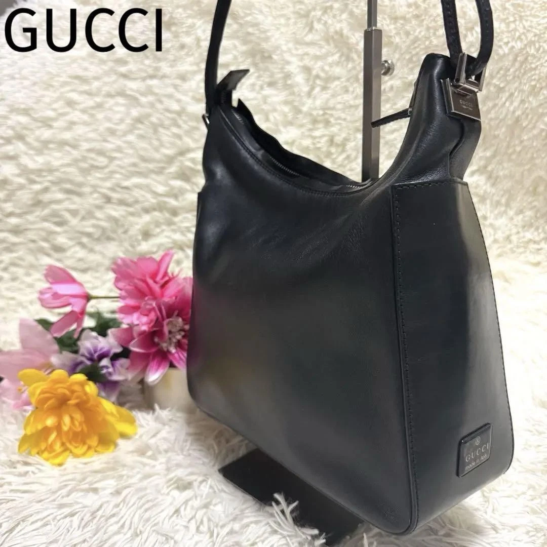Plaque GUCCI tout cuir logo une épaule noire demi