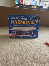 How to play harmonica / book  kit included