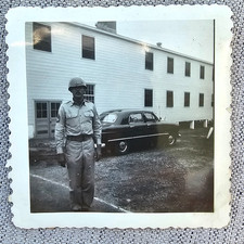 ORIGINAL WWII ERA ARMY SGT. POSING FOR PHOTOGRAPH NEAR BARRACKS AND OLD CAR