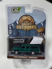 Greenlight 1990 Chevrolet Suburban - Green with Modern Rooftop Camper 1/64