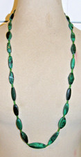 Vintage 1950s genuine green malachite necklace torpedo shaped beads long length