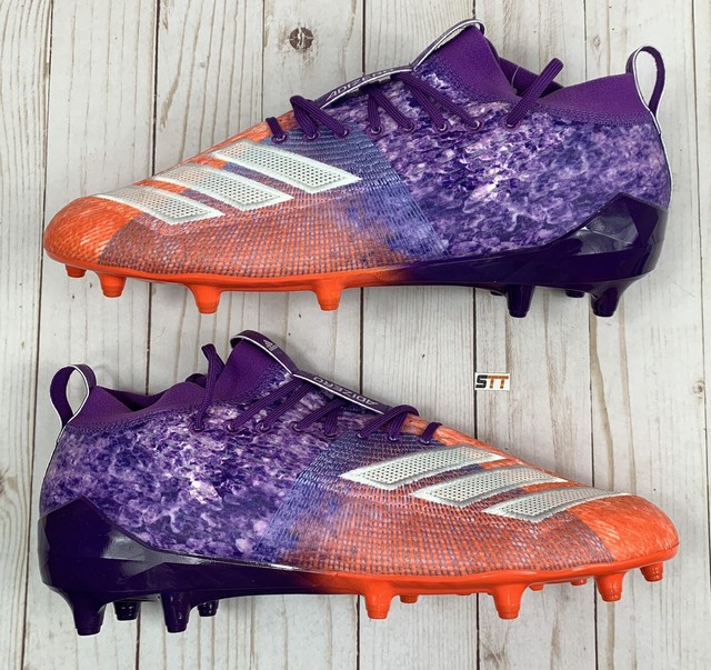 purple and orange cleats