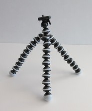 Flexible wrap adjustable TRIPOD for holding Digital Cameras only used once.