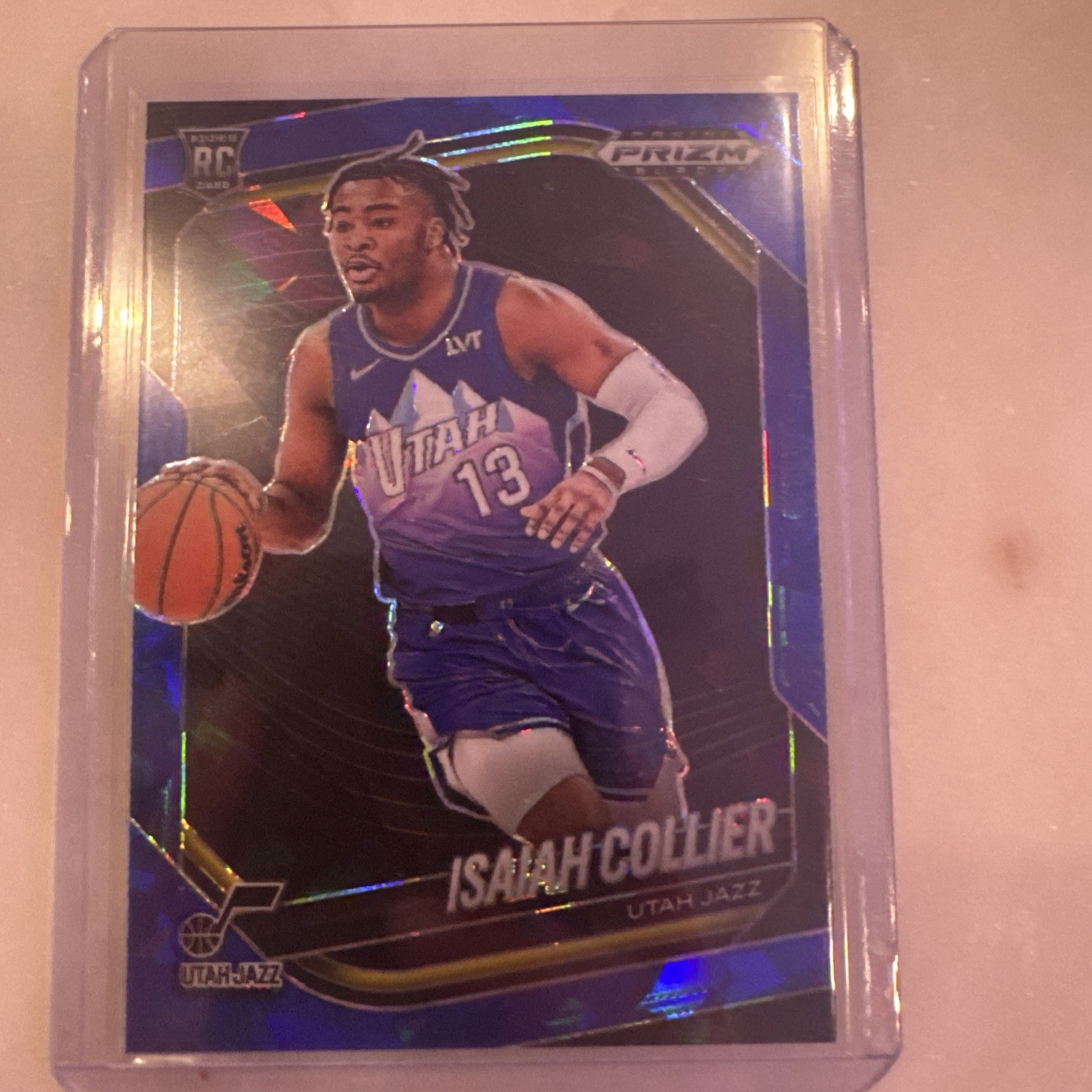 2024-25 Panini Prizm Black Isaiah Collier #32 RC Rookie Blue Ice /125