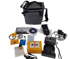 Kodak Instamatic 304 Instant Camera with Flash and Other Misc. Accessories
