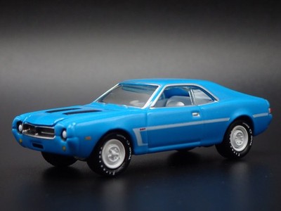 2025 JOHNNY LIGHTNING 1969 AMC JAVELIN SST CLASSIC GOLD REL 2 VS A