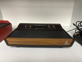 Atari 2600 System Bundle with Console, Games, Joystick, Paddles, and More LOT