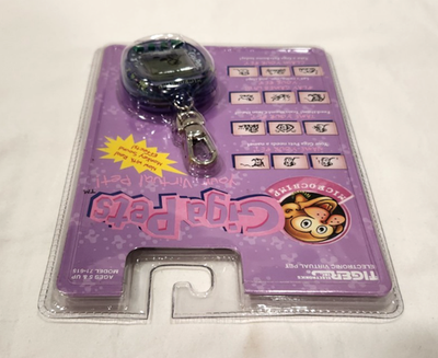 Giga Pets Microchimp Monkey Virtual Pet Tiger Electronics 1997 for