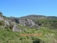 PHOTO  ROCKY LANDSCAPE THE ROCKS GRASS BOG AND TREES THAT ARE TYPICAL OF THIS AR