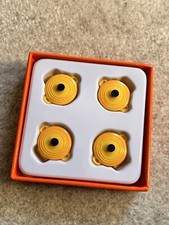 Le Creuset Dijon Żółty kolor Okrągły żeliwny klips do garnka (4 sztuki w pudełku)